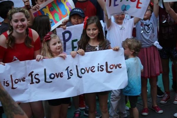 Young people from the Broadway community sing John Lennon's 'Imagine' for peace Photo